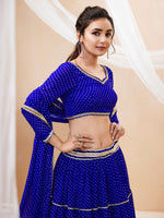 blue wedding lehenga with traditional leheriya pattern