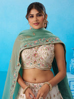 cream sky sequined lehenga choli for festive occasions