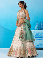 cream and sky indian wedding outfit with zari work