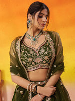 green semi stitched bridal lehenga with designer blouse