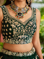 green indian bridal outfit with embroidered organza lehenga