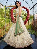 green party wear tissue lehenga with dupatta