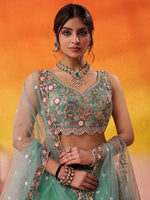 green festive lehenga choli with tissue fabric embroidery