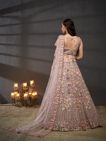 elegant mauve bridal lehenga with embroidered net fabric