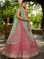 pink festive lehenga choli with heavy embroidered details