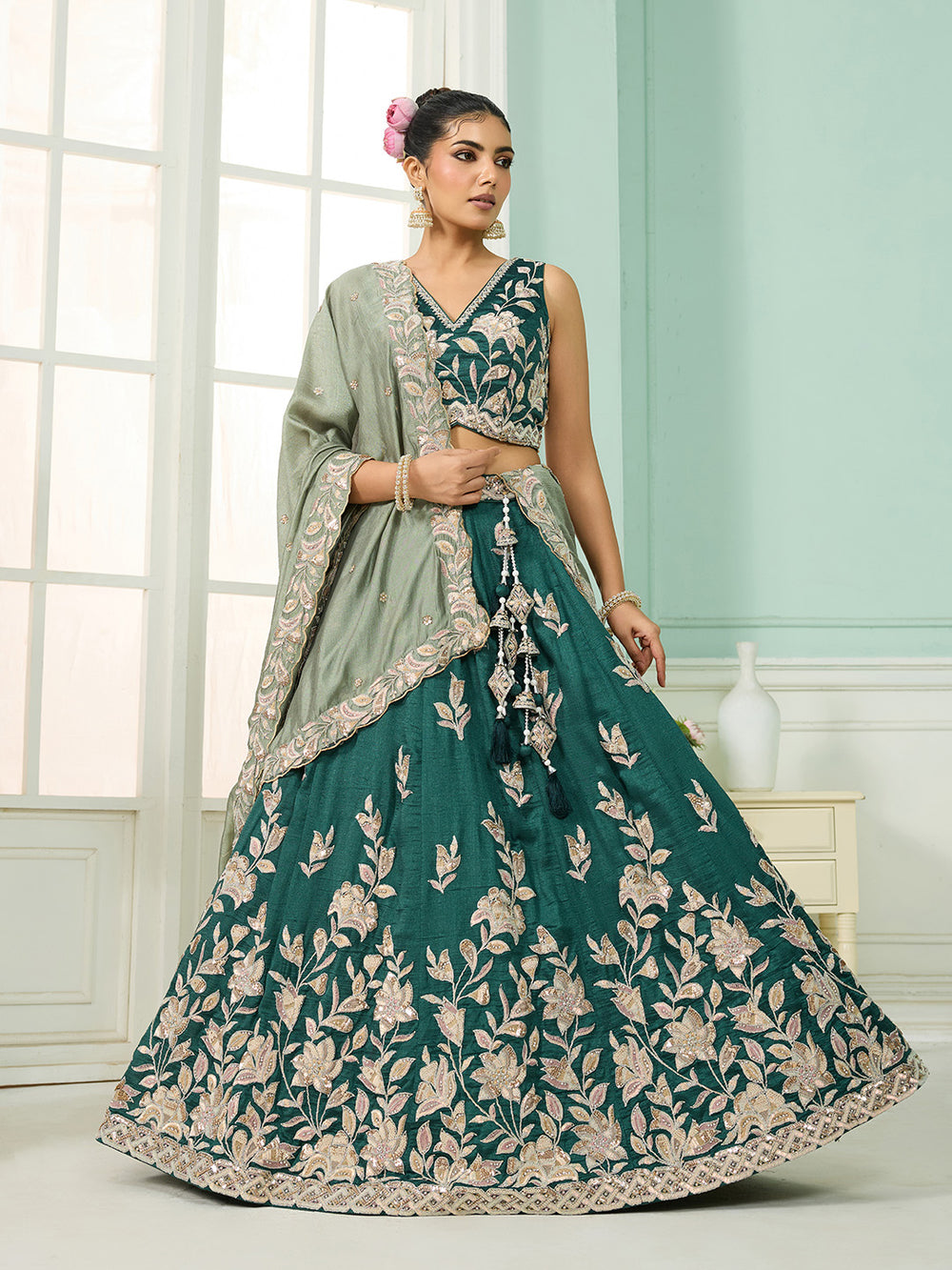 green silk bridal outfit with designer embroidery