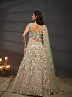 sea green embroidered net lehenga choli for reception