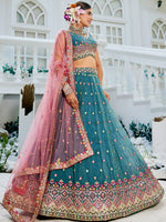 teal designer wedding outfit with embroidered lehenga choli