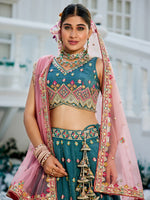 teal indian bridal lehenga choli with heavy embroidery