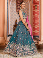 teal traditional lehenga choli with heavy embroidery