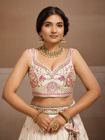 white wedding lehenga choli with elegant embroidery