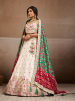 white festive tissue lehenga choli with embroidery