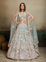 turquoise blue net fabric sequins embroidery semi stitched lehenga with unstitched blouse and dupatta