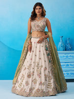 cream and green wedding wear lehenga choli