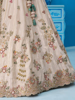 cream and green party wear tissue lehenga