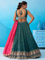 teal indian bridal outfit with embroidered lehenga