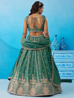 teal indian bridal outfit with tissue fabric lehenga