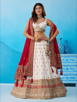 heavy embroidered white cream bridal lehenga choli