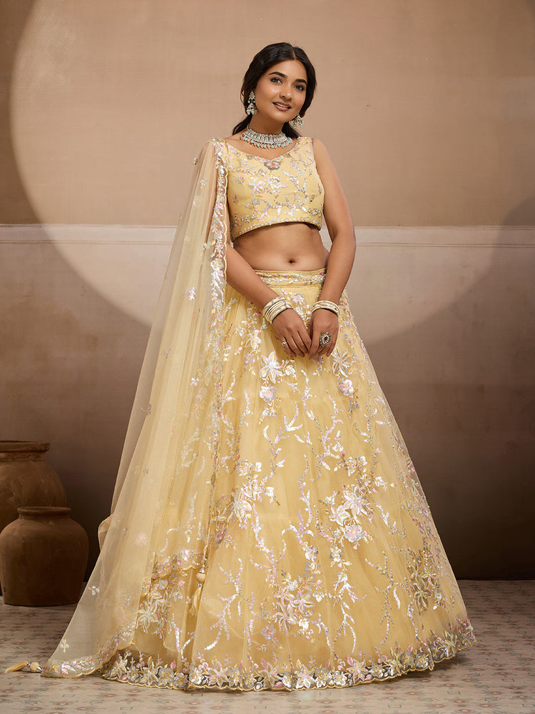 yellow net fabric sequins embroidered semi stitched lehenga choli
