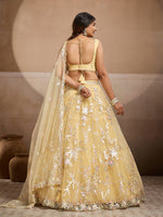 yellow wedding lehenga choli with unstitched blouse