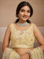 yellow party wear net lehenga choli with dupatta